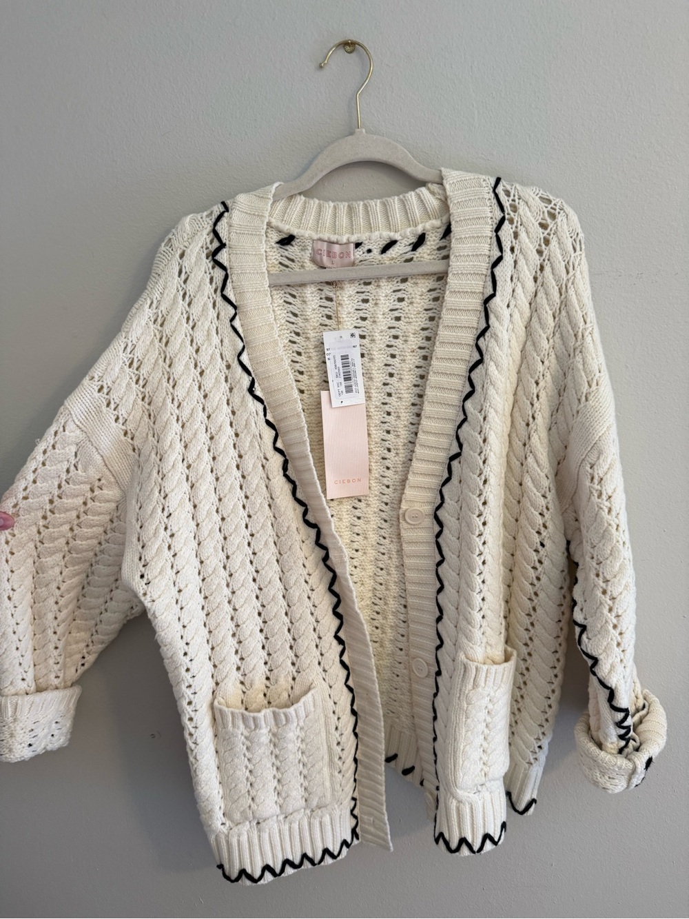 Open-Knit Cream Cardigan with Black Contrast Trim